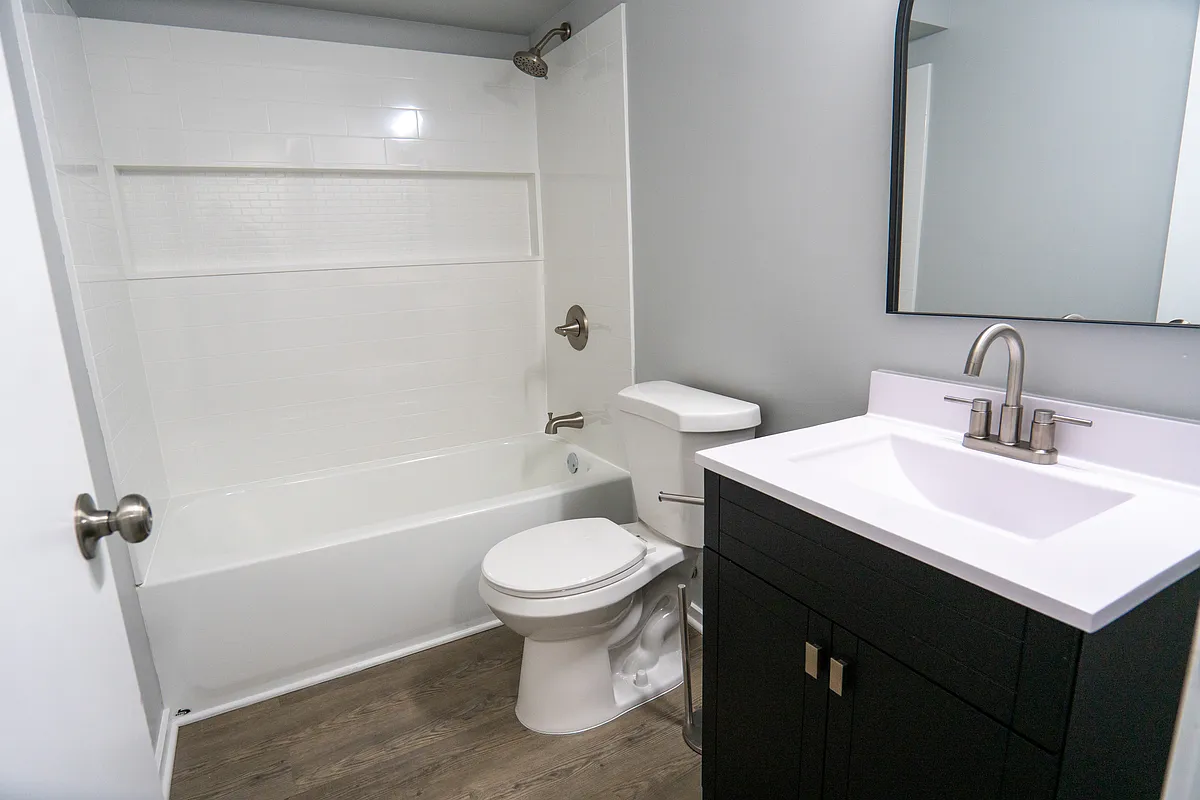Lansing Apartments — Updated Bathroom with Modern Vanity